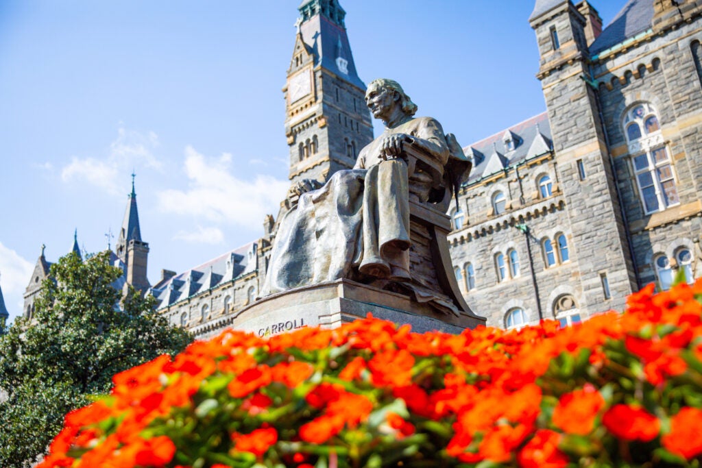 View of John Carroll statue in front of Healy Hall